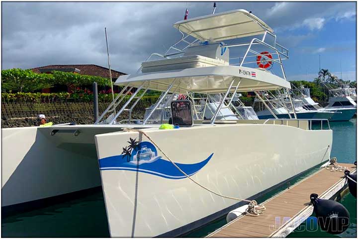 Angle view of 39' catamaran docked at Los Sueños Marina in Costa Rica