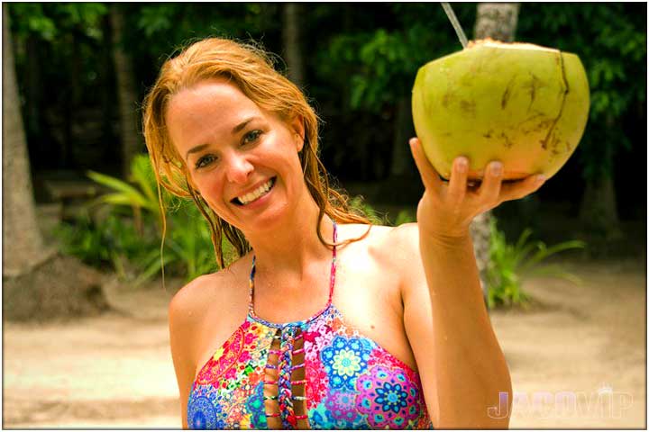 Girl with coconut in her hand