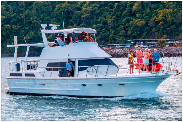 Angle view of party boat in costa rica with guests aboard