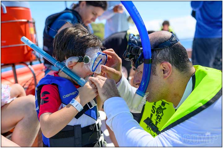 Father and son snorkeling in Costa Rica