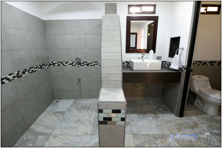 Bathroom with shower, toilet and sink