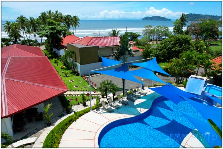 Drone view of pool and Jaco Beach