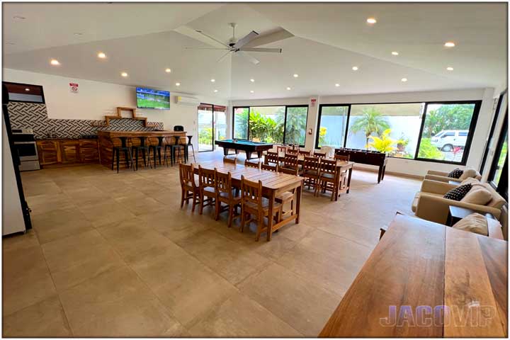 Large exotic wood dining tables in living room