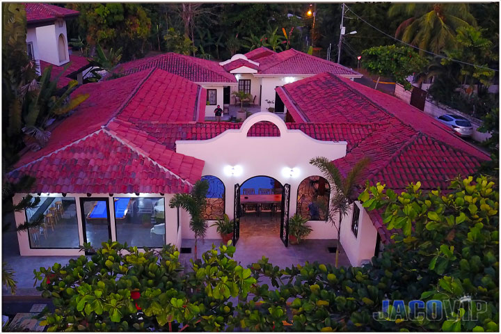 beachside drone photo of Casa Ponte Beach at night