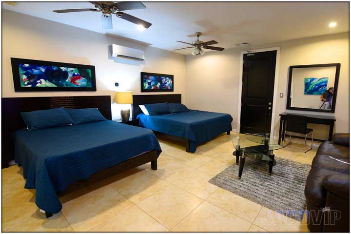 TV dresser and sofa with coffee table in the bedroom