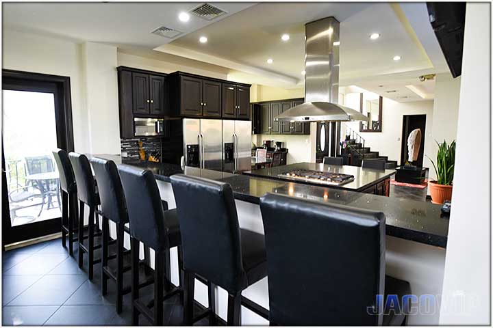 newly renovated kitchen with island and bar