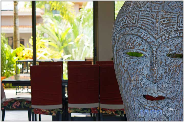 Large mask at entrance of Casa Ponte