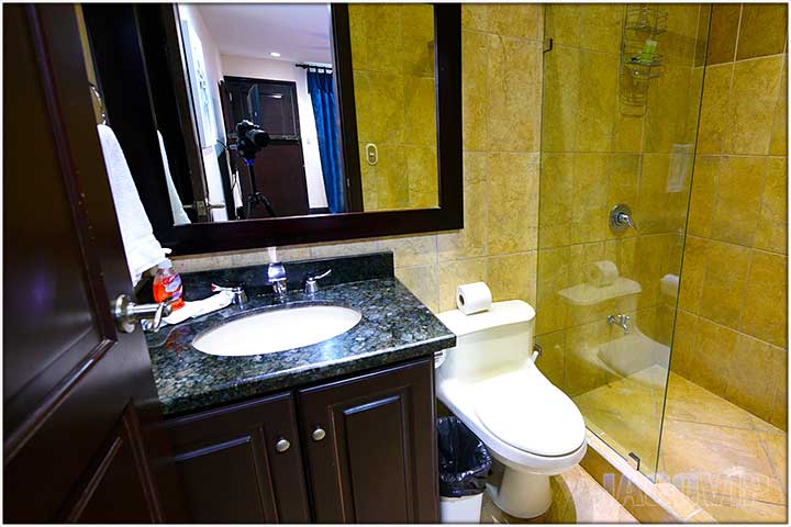 Bathroom with black granite counter top