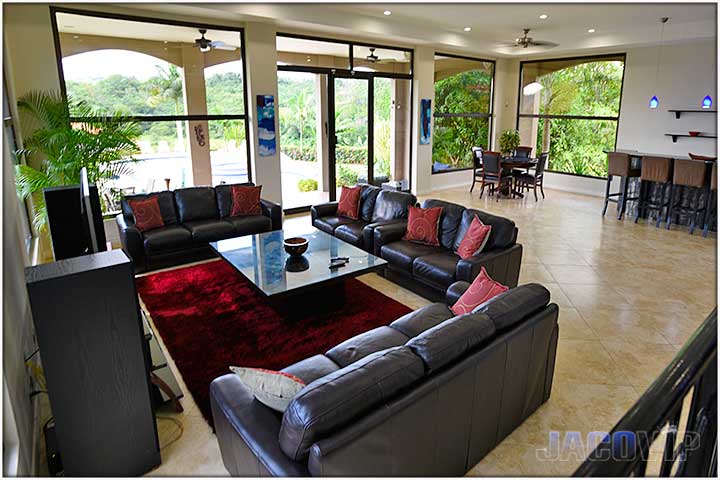 Three large sofas in living room