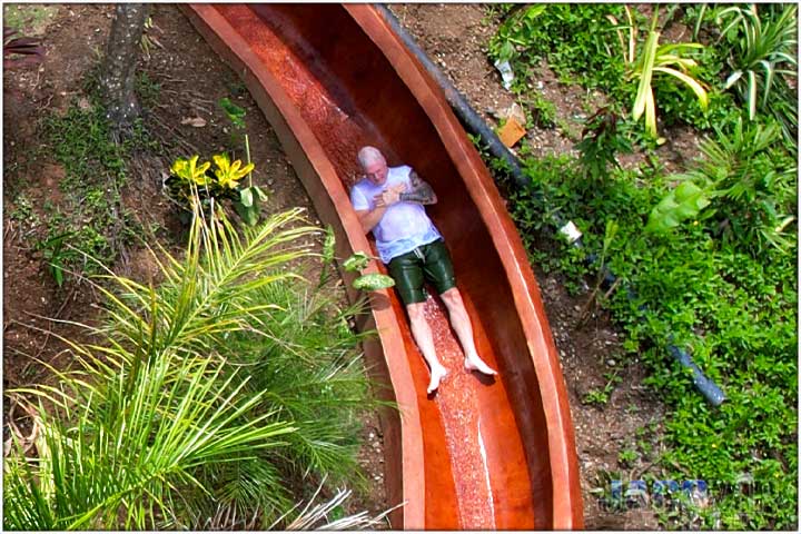 New second water slide close up of client sliding down