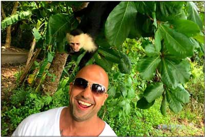 Monkey on head of guest at Manuel Antonio National Park