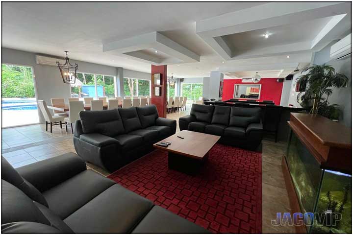 White sofa and large fish tank in living room