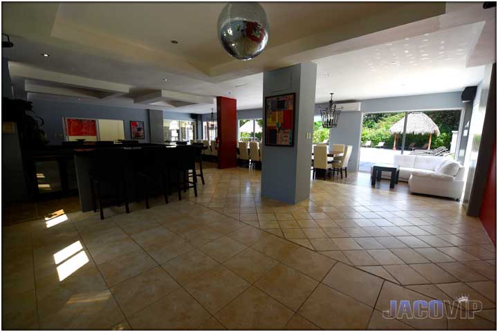 Dance floor area with laser light and disco ball in the livingn room