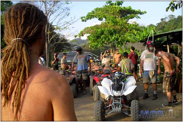 Guy with long haid dreads and friends