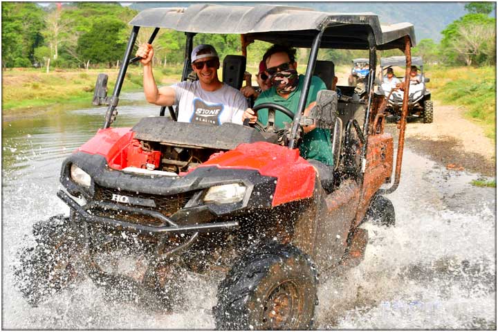 Bachelor party group driving Honda side by side vehicles