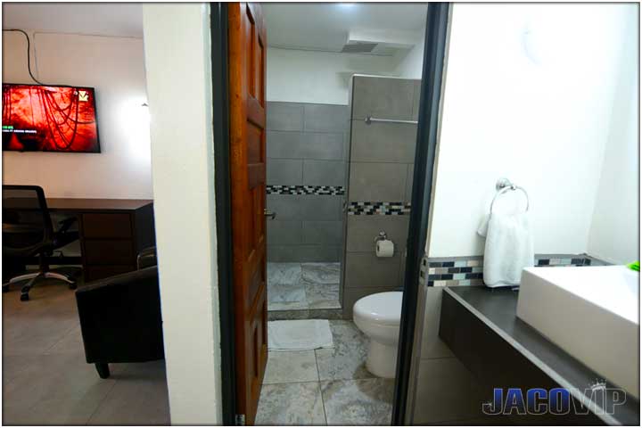 Split view of bathroom and bedroom