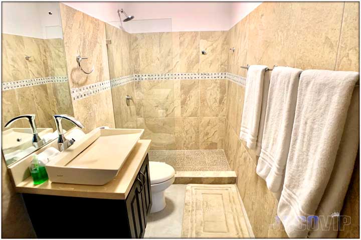 Fully renovated bathroom with modern tiles