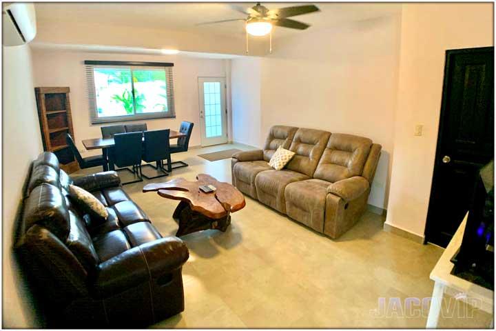 Living room with two sofas and TV