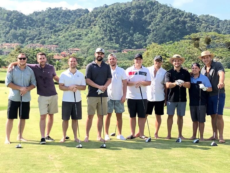 group of guys playing golf in Los Sueños Costa Rica