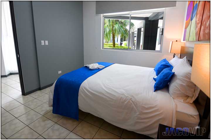 Bedroom number 7 with blue accent pillows