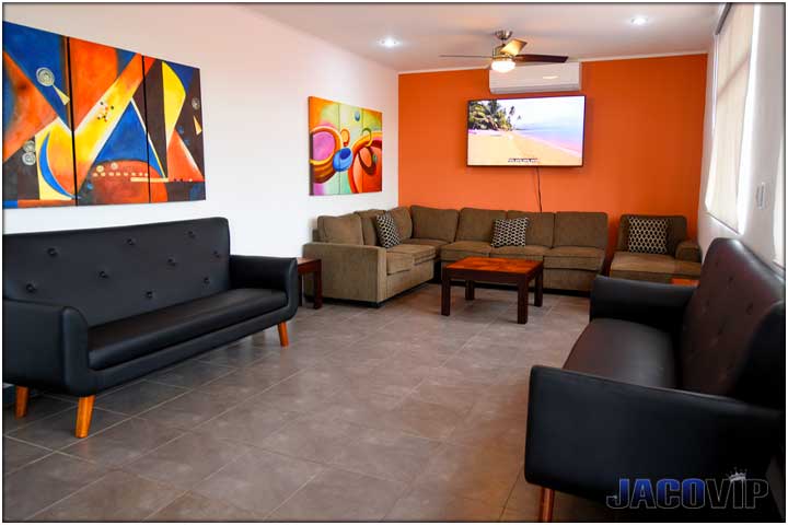 Living room with orange accent wall