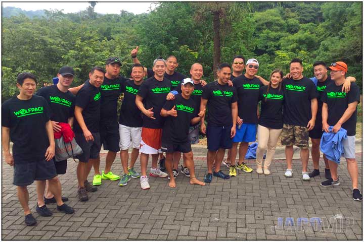 Bachelor party group with matching shirts on driveway at villa los amigos