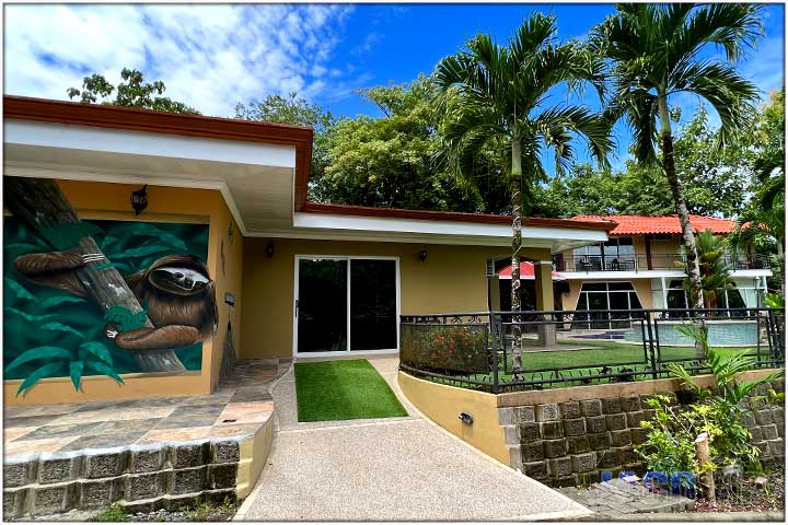 Exterior of Villa Los Amigos at sunset