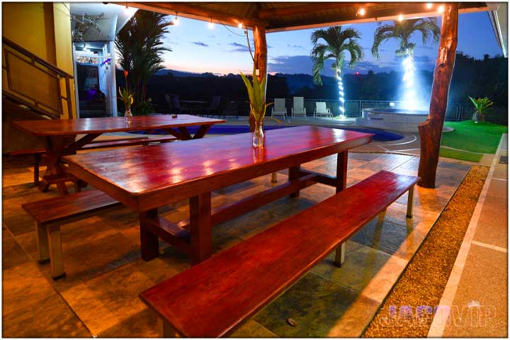 Wood picnic tables in the evening