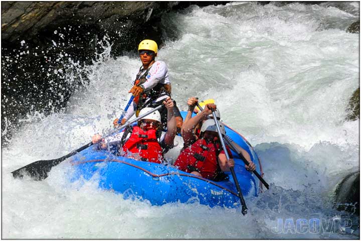 White water and grey boulders